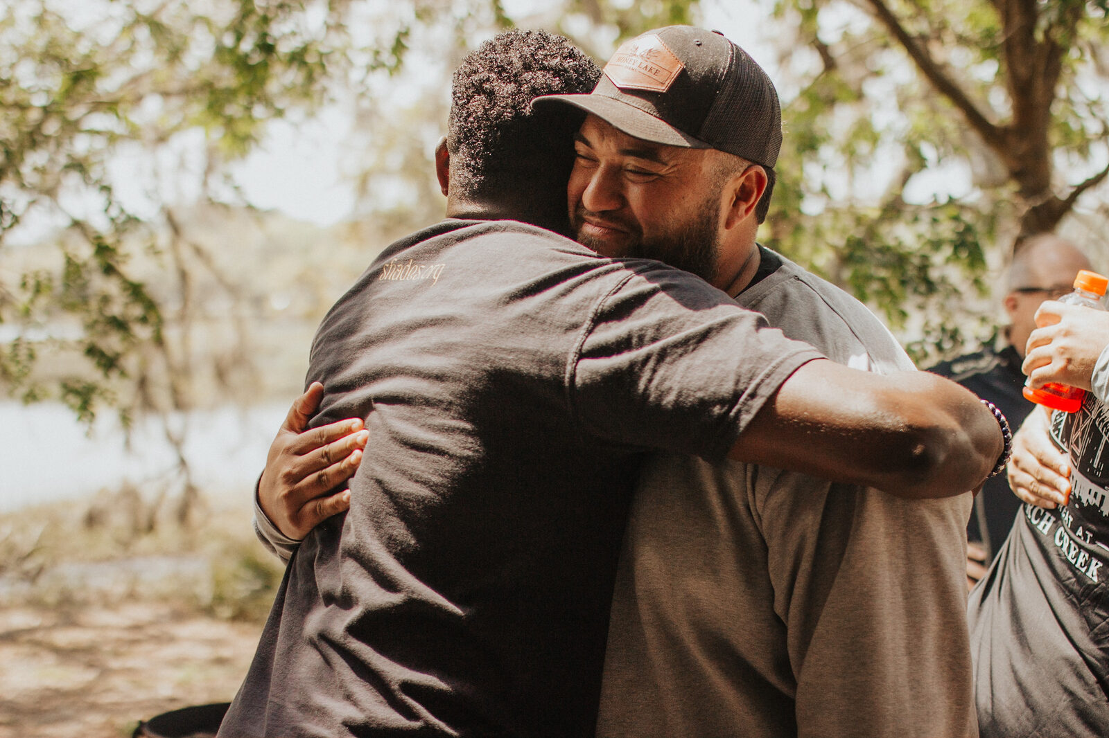 Two guests embracing
